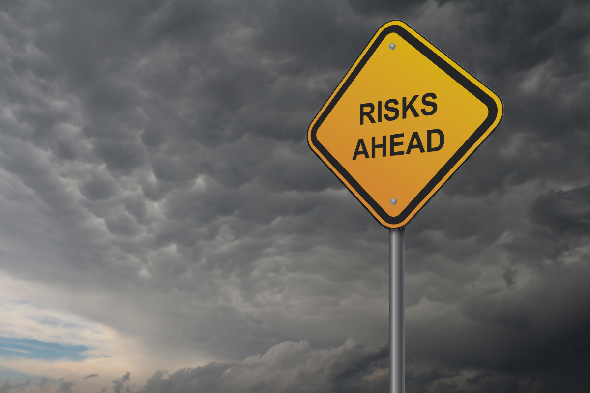 Graphic illustrating common environmental risks in property transactions, including contaminated soil, hazardous materials, and regulatory compliance issues.